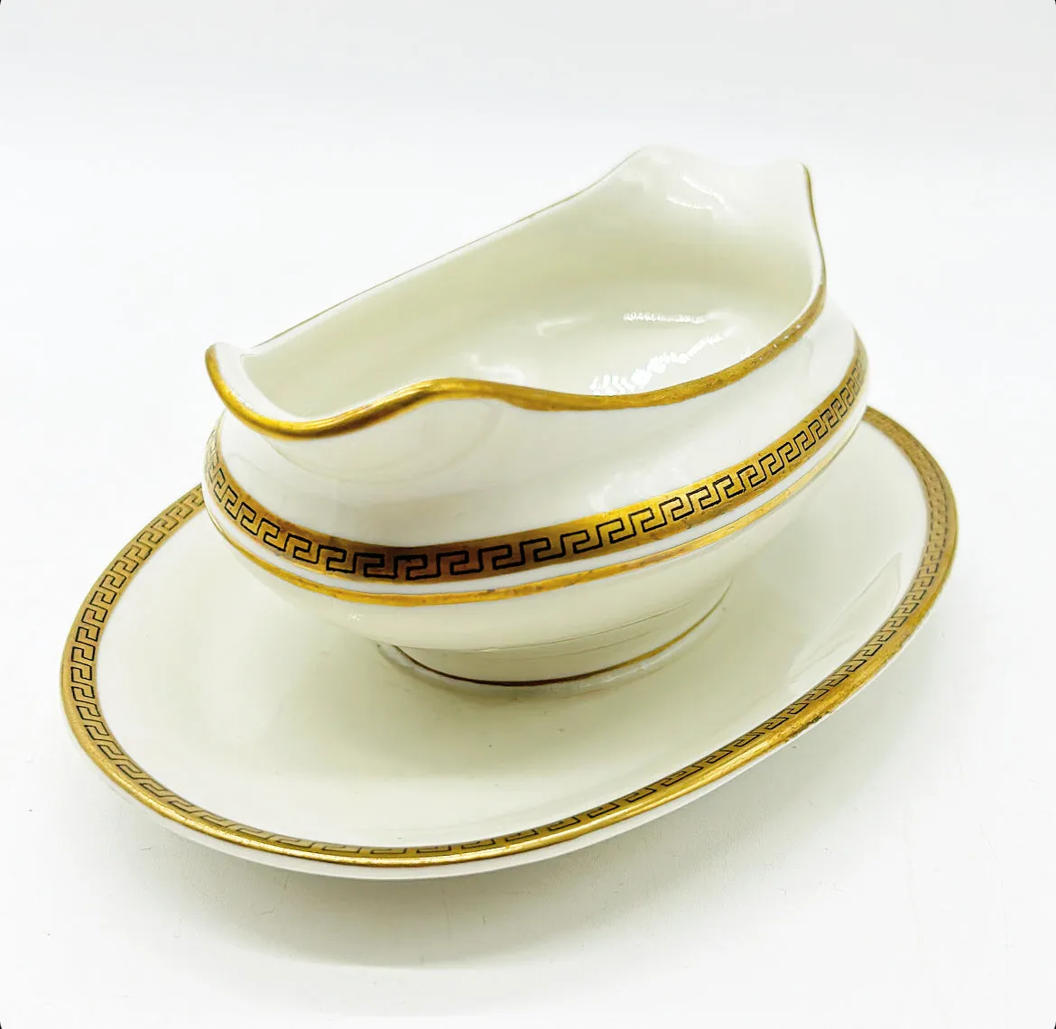 &nbsp;Antique Greek key border gravy boat with attached oval base plate.